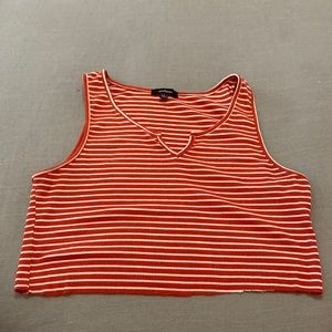 Cropped, orange and white striped tank top.